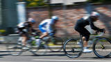 cyclists run on the city street